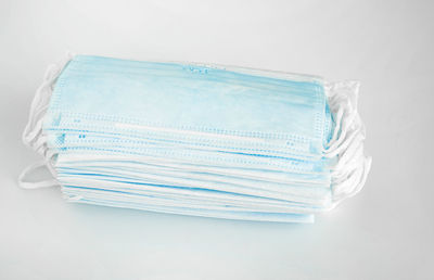Close-up of blue stack against white background