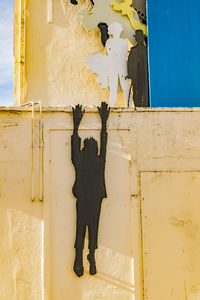 Shadow of man on wall