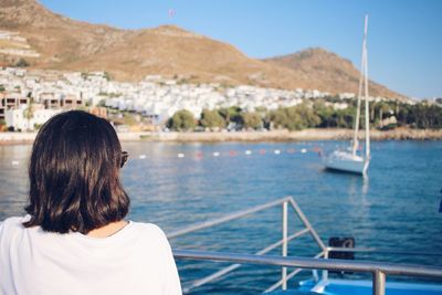 Rear view of woman looking at sea