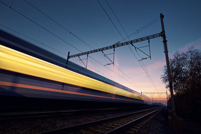 Railway at beautiful dawn. long exposure of train on railroad track. 