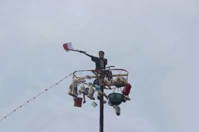 Low angle view of street light against sky