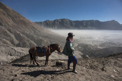 Man riding horse