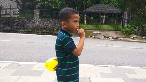 Cute boy playing outdoors