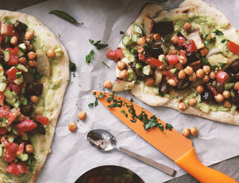 High angle view of pizza served in plate