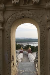 Scenic view of sea against sky seen through window