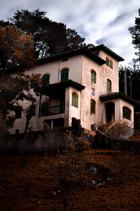 Low angle view of old building against sky