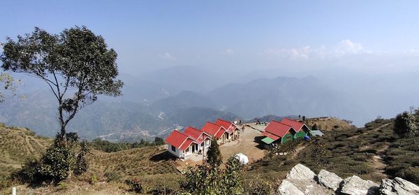 High angle view of trees and houses against sky