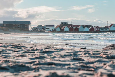 Surface level of beach against sky