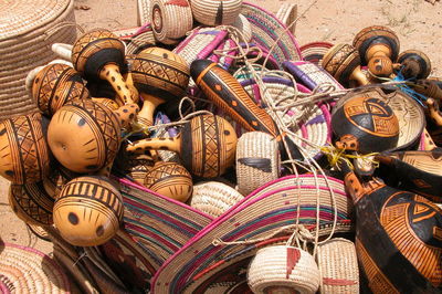 High angle view of baskets in market for sale