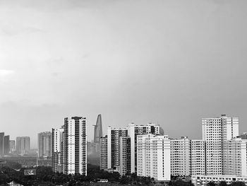 Modern buildings in city against sky