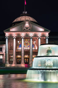 Illuminated building at night