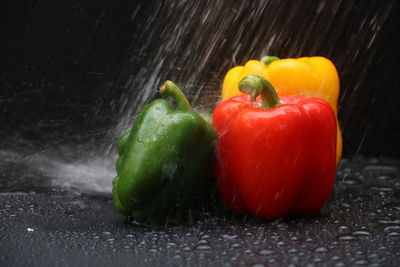 Close-up of wet red bell peppers
