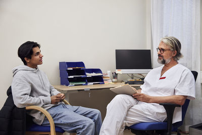 Doctor and patient in doctor's office