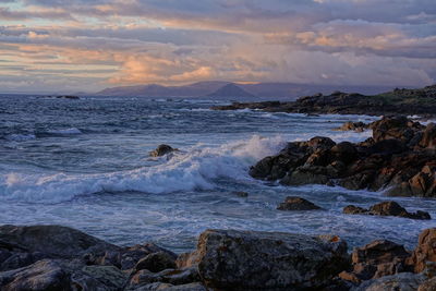 Scenic view of sea against sky during sunset