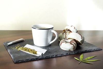 Close-up of coffee cup on table