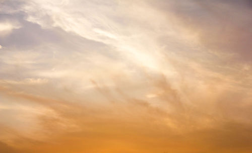 Low angle view of cloudy sky during sunset