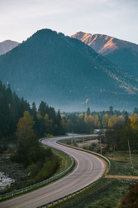 High angle view of road with mountain in background