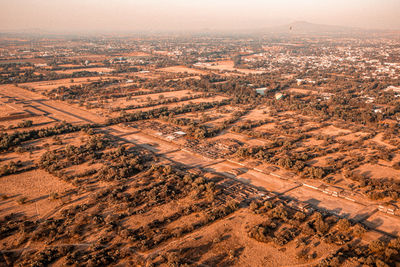 High angle view of city buildings against sky