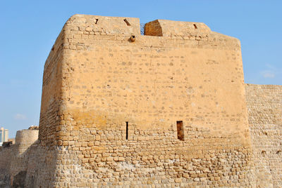 Low angle view of fort against the sky