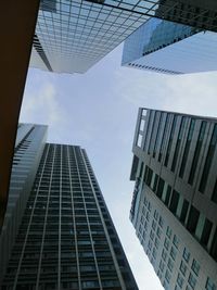 Low angle view of modern buildings against sky