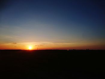 Scenic view of silhouette landscape against sky during sunset