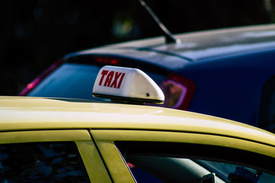 Close-up of taxi in city