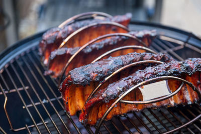 Close-up of meat on barbecue grill