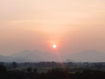 Scenic view of silhouette landscape against sky during sunset