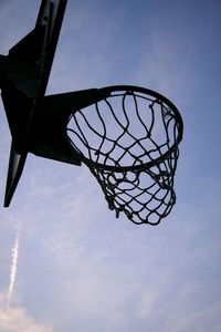 Low angle view of basketball hoop against sky