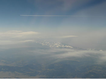 Aerial view of vapor trails in sky