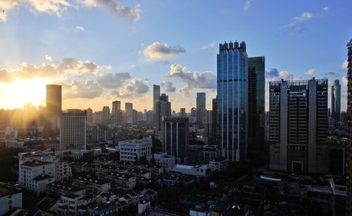 Modern buildings in city against sky