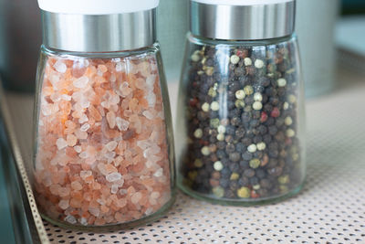 Close-up of glass jar on table