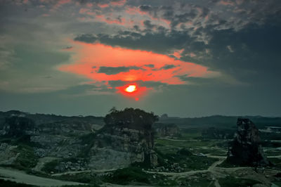 Scenic view of landscape against sky during sunset