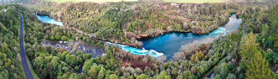 High angle view of river amidst trees in forest