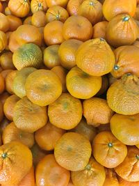 Full frame shot of oranges at market stall