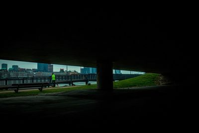 Road in city against clear sky