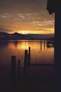 Scenic view of lake against sky during sunset