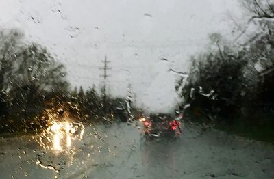 Car on road during rainy season