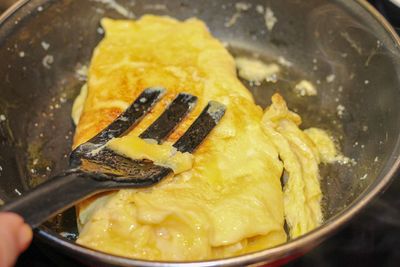 Close-up of person preparing food