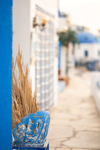 White and blue architecture on santorini island on blurred background traditional greek house 