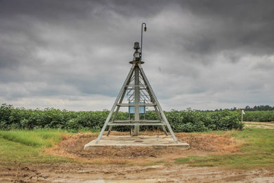 View of built structure on field against sky