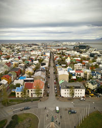 High angle view of buildings in city against sky