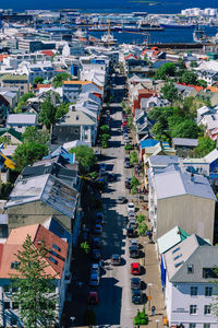 High angle view of street amidst buildings in city