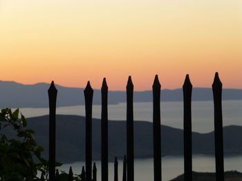 Scenic view of sea against clear sky during sunset