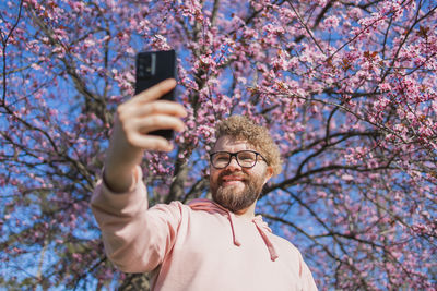 Young man using mobile phone