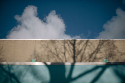 Low angle view of building against blue sky