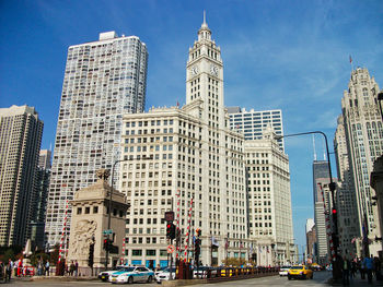 Modern buildings in city against sky