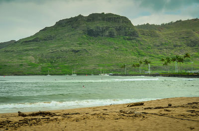 Scenic view of beach against sky