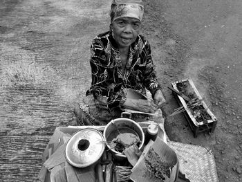 Portrait of mid adult man sitting at table