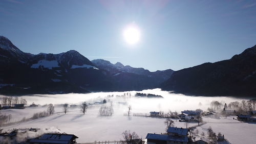 Scenic view of snowcapped mountains against sky during winter